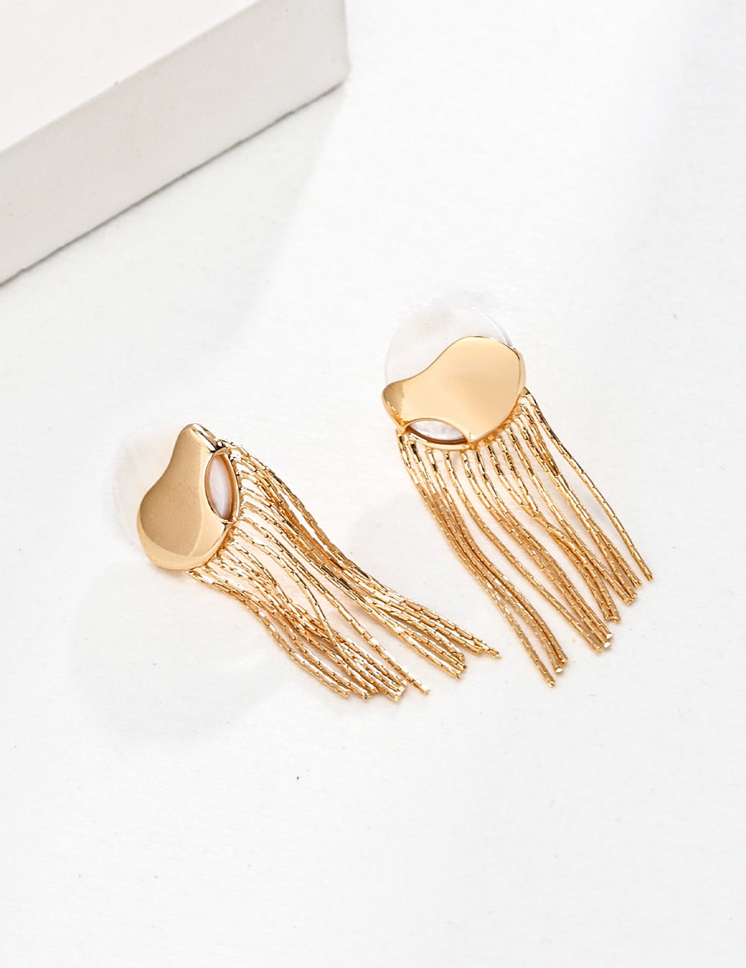 Gold and silver dangling tassel earrings