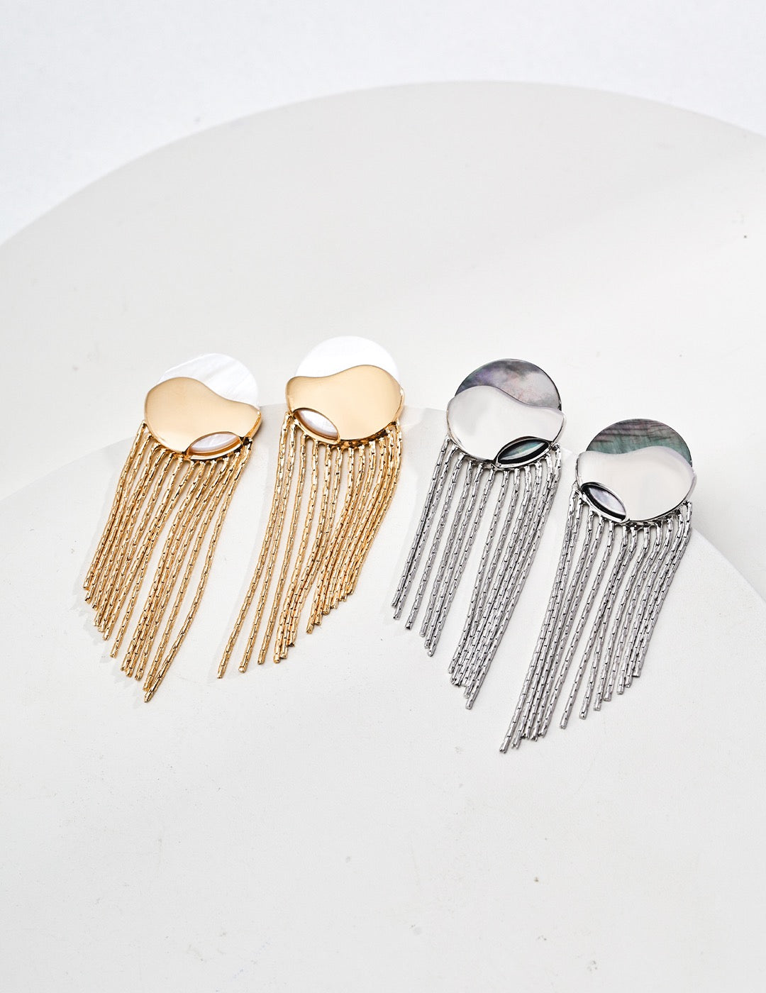 Gold and silver dangling tassel earrings