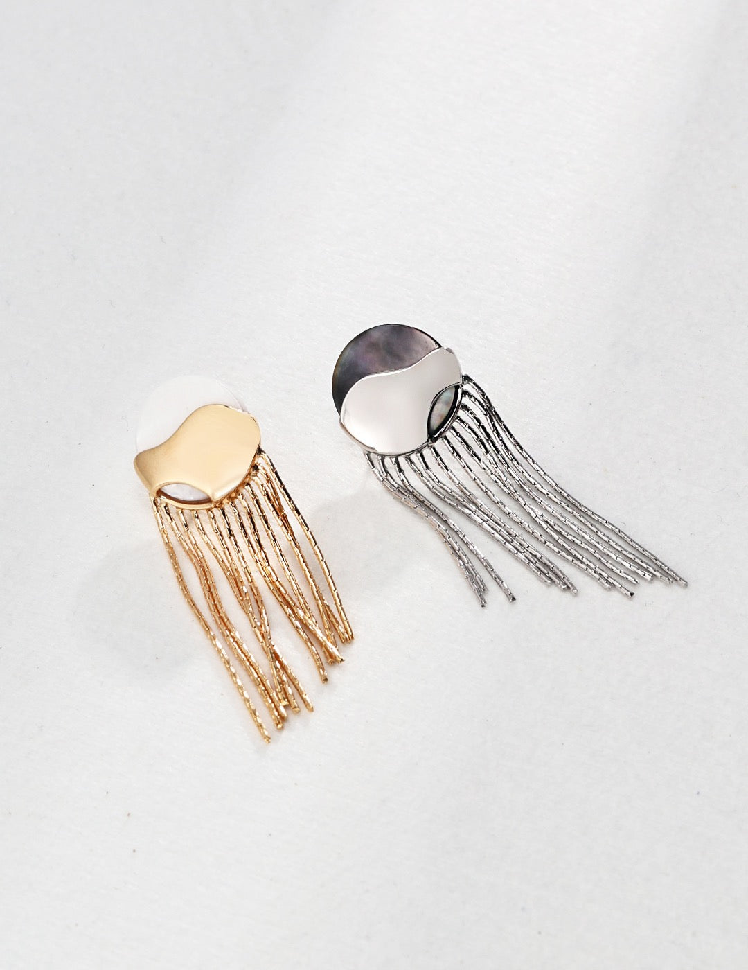 Gold and silver dangling tassel earrings