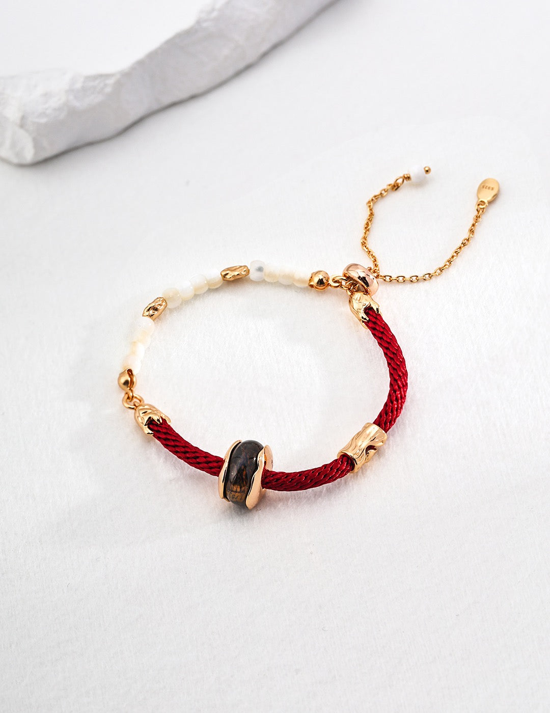 Lucky red string with tiger eye stone