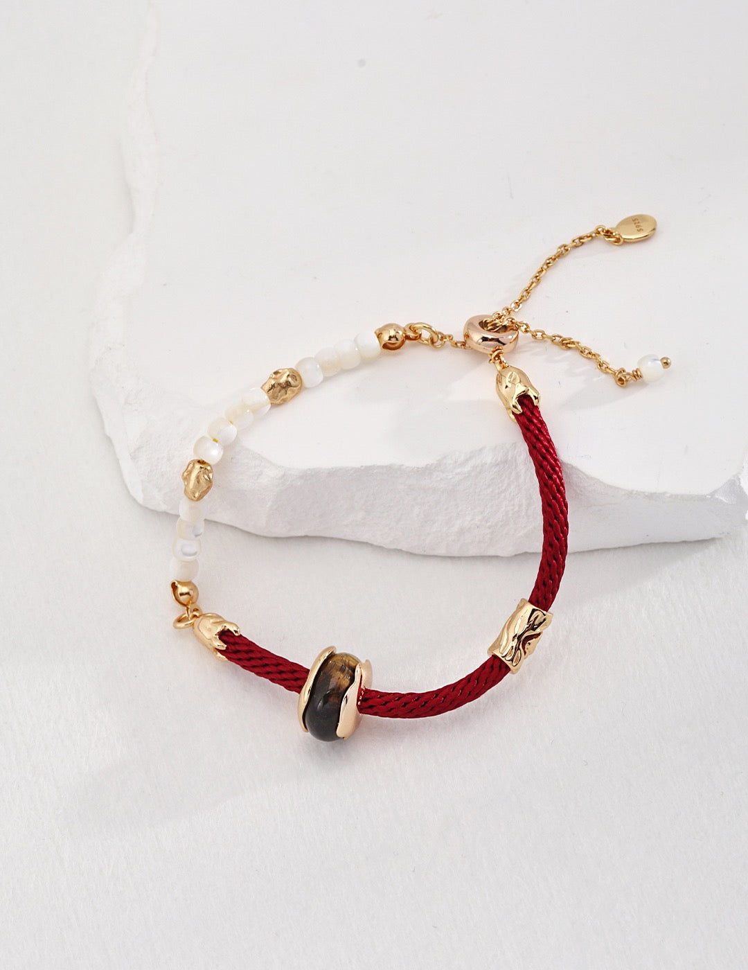 Lucky red string with tiger eye stone