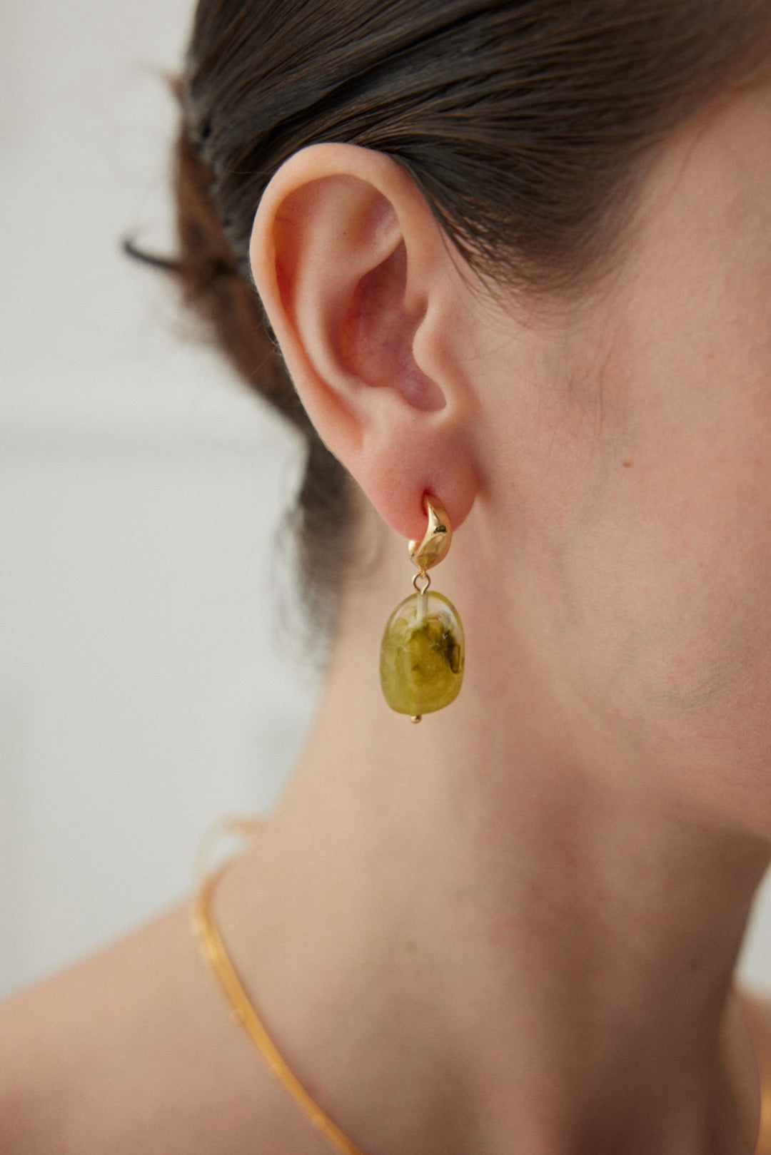 Green resin stone drop earrings